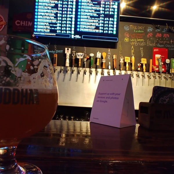 Photo taken at The Beer Growler by Olly W. on 11/15/2018