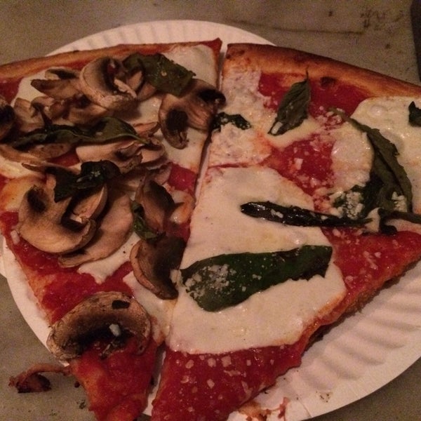 Photo taken at South Brooklyn Pizza by Leslie T. on 1/8/2014