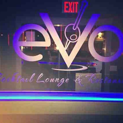 Photo taken at Evo cocktail lounge &amp; restaurant by Elamin C. on 11/23/2014