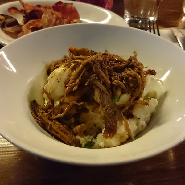 The pulled pork grits are a little too dry, but the much tipped mushroom toast is great and the popcorn is amazing.