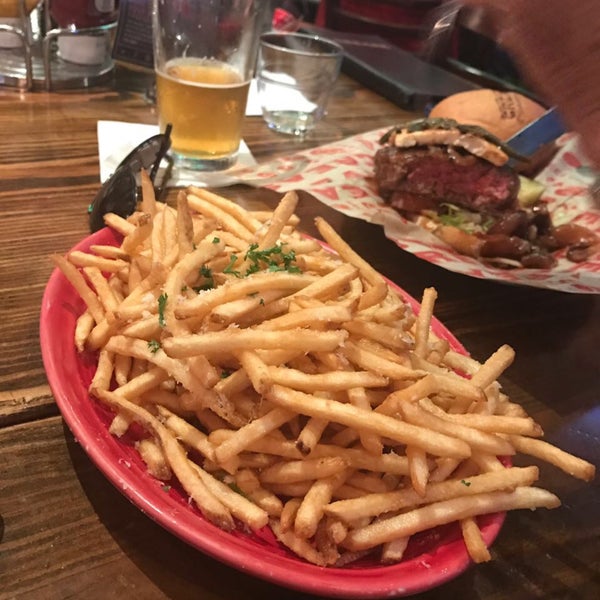 Photo taken at Grease Burger, Beer and Whiskey Bar by Carolina B. on 1/11/2018