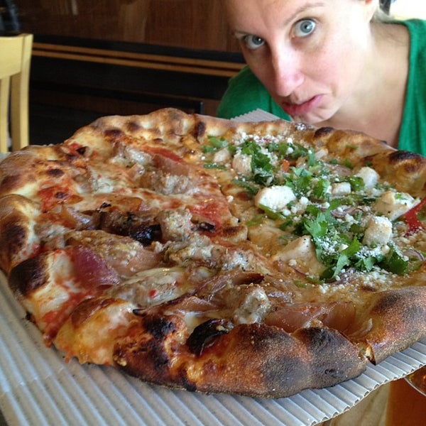 Photo taken at Howie&#39;s Artisan Pizza by Alex F. on 9/22/2012