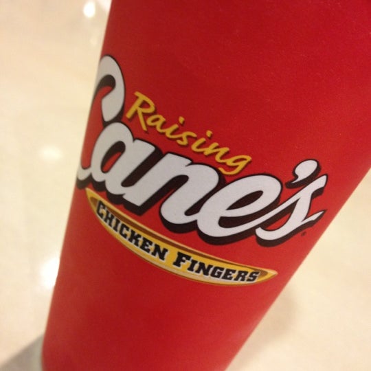 Photo taken at Raising Cane&#39;s Chicken Fingers by Esther K. on 12/8/2012