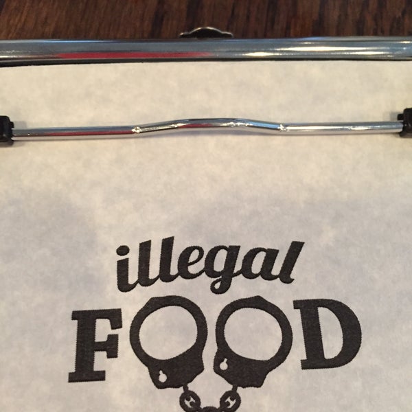 Foto tirada no(a) Illegal Food por Christina W. em 4/29/2015