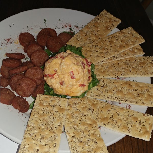 Tomato aspic, oyster po' boy, pimento cheese and Cajun sausage plate