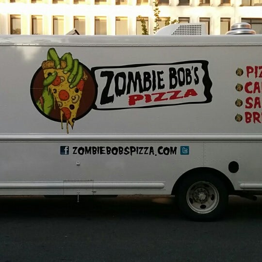 Photo taken at Zombie Bob&#39;s Pizza by Eugene M. on 10/2/2014