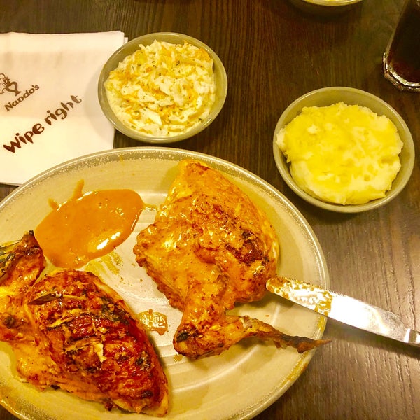 Photo taken at Nando&#39;s by Can E. on 3/19/2019