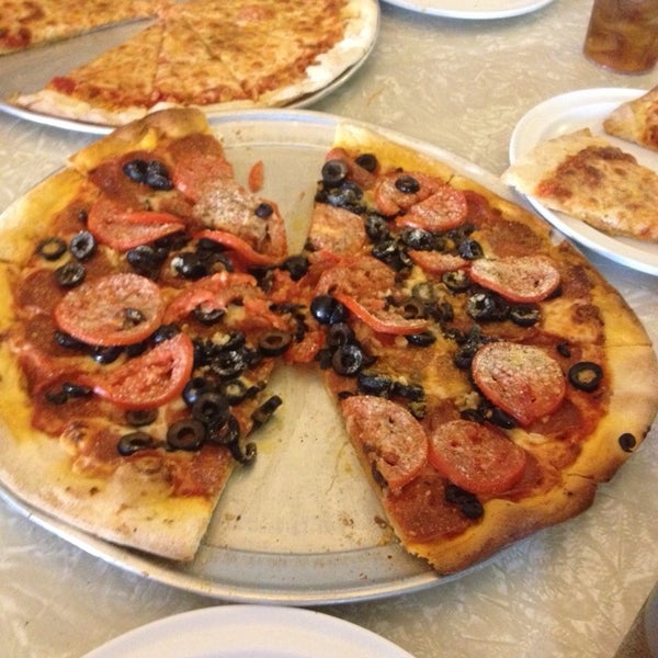 Photo taken at Luigi&#39;s Pizza Parlor by Kay K. on 8/17/2014