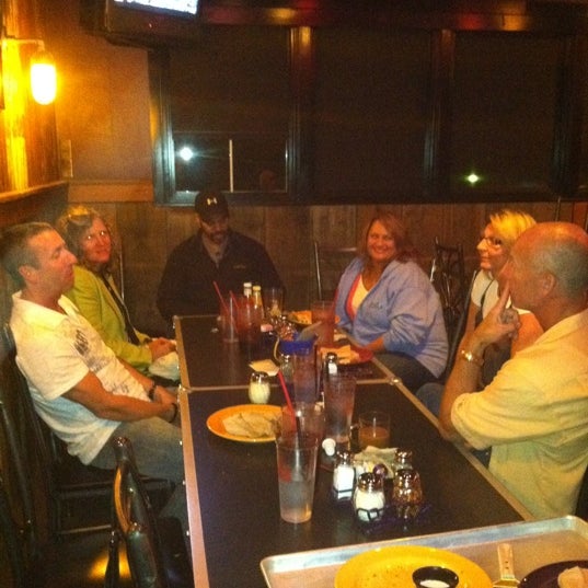 Photo taken at The Rock Wood Fired Pizza by Cindy L. on 8/13/2011