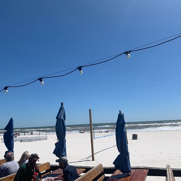 Photo taken at Sharky&#39;s Beachfront Restaurant by Sandi S. on 4/20/2019