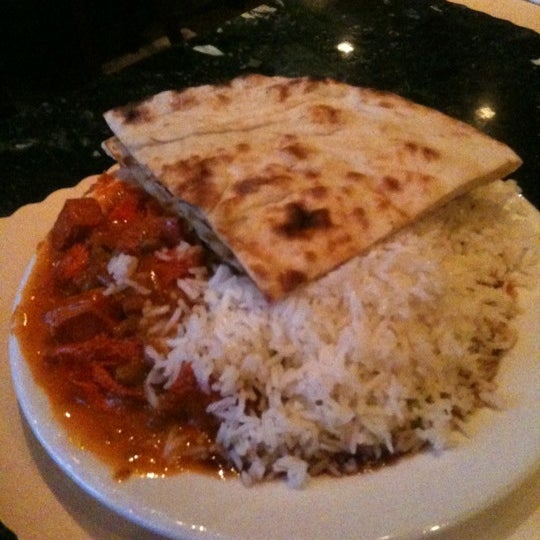 Photo taken at New Delhi Indian Restaurant by John Cecil P. on 10/13/2012