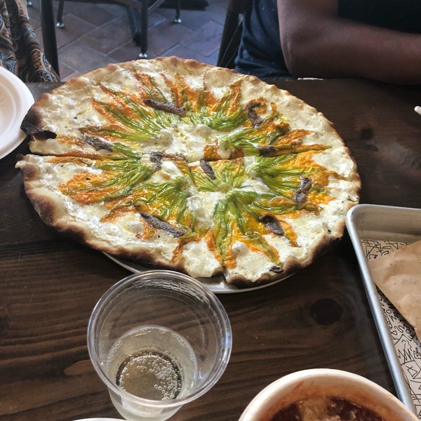 the white pizza with squash and anchovies is delicious and looked better than any other pizza i ever had!