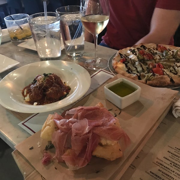 Photo taken at Spuntino Wine Bar and Italian Tapas by Victoria M. on 6/12/2017