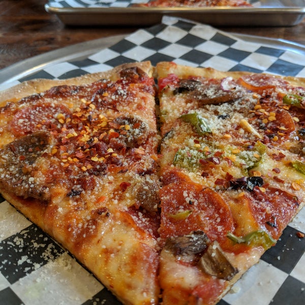 Photo taken at Wiseguy NY Pizza by Ron P. on 6/28/2018