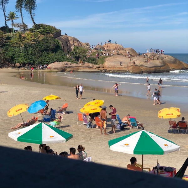 Photo taken at Praia da Joaquina by Ariane K. on 6/22/2019