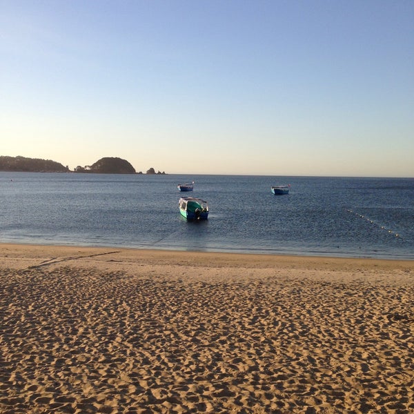 Photo taken at Playa de Dichato by Andrés C. on 3/15/2015