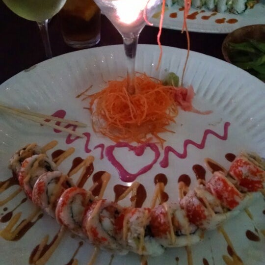 Photo taken at Galanga Thai Kitchen &amp; Sushi Bar by Adam C. on 10/24/2014
