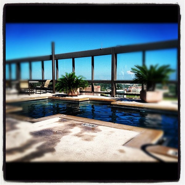 Photo taken at Omni Hotel Pool by Sally on 10/14/2012