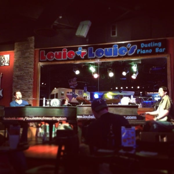 Photo taken at Louie Louie&#39;s Dueling Piano Bar by Krysten C. on 3/15/2013