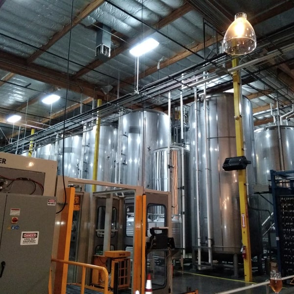 Photo taken at Green Flash Brewing Company by Caroline A. on 12/19/2018
