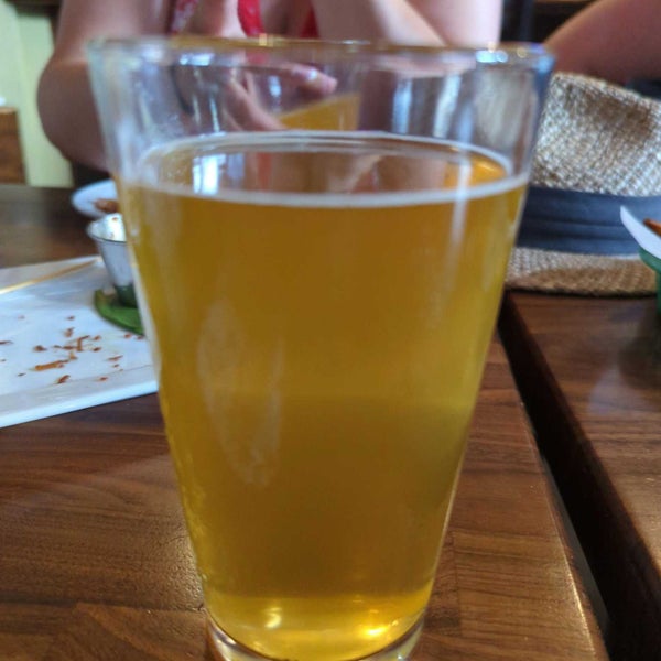 Photo taken at Kauai Island Brewery &amp; Grill by Zach P. on 6/8/2022