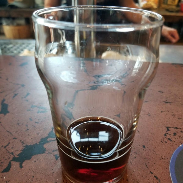 Photo taken at Crow Peak Brewing Company by Ethan D. on 8/19/2018