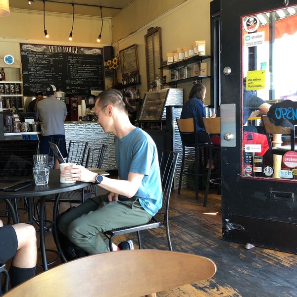 Photo taken at Velo Rouge Cafe by Sam W. on 9/11/2019