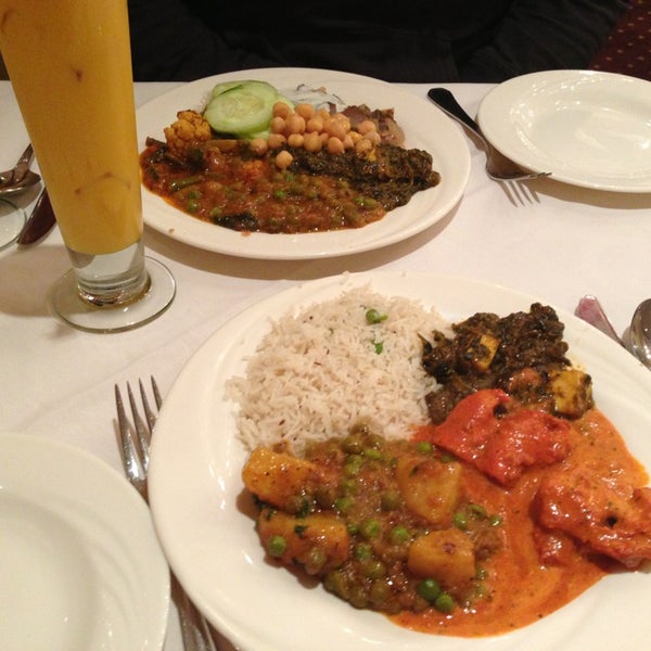 Photo taken at Akbar Indian Restaurant by Angelo P. on 1/13/2013