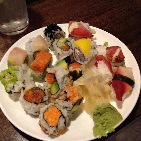 Photo taken at Kumo Ultimate Sushi Bar &amp; Grill Buffet by Ernie B. on 7/21/2013