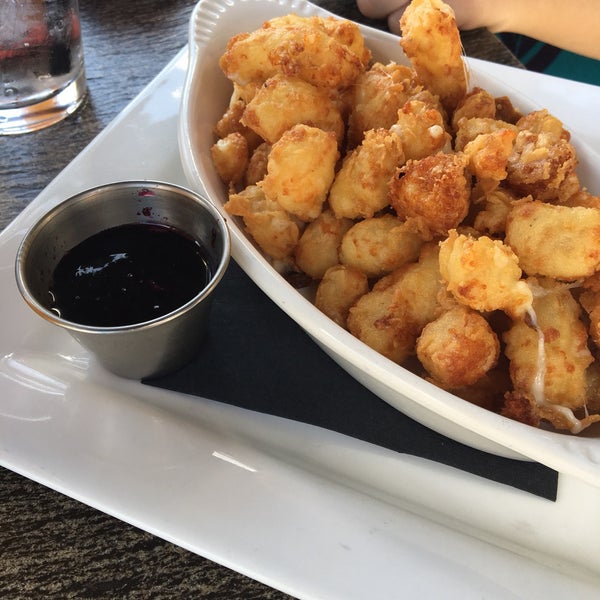 Smoked blueberry ketchup goes surprisingly well with the cheese curds