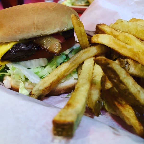 Photo taken at Hut&#39;s Hamburgers by Bill J. on 5/1/2019