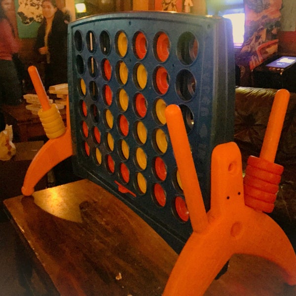 This bar has tons of games. Giant Jenga and Connect 4, as well as pinball, a pool table and more. Also: free popcorn!