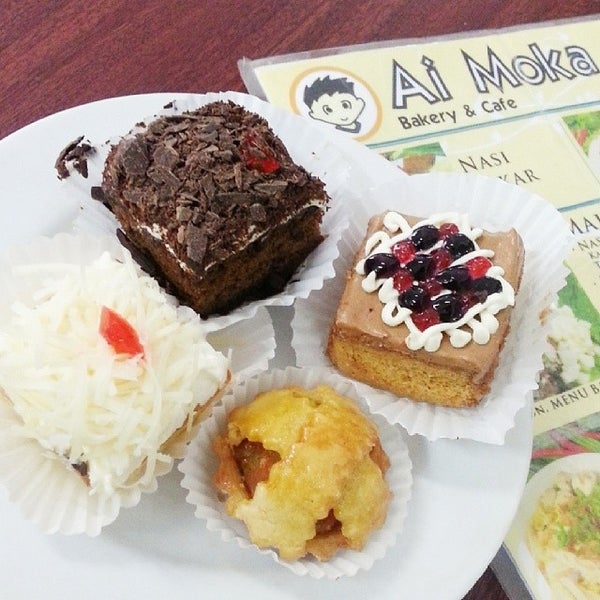 Photo taken at Ai Moka Bakery and Cafe by Silvia F. on 1/7/2014