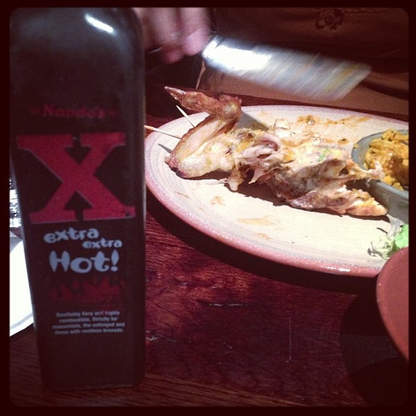 Photo taken at Nando&#39;s by Michael G. on 2/4/2013