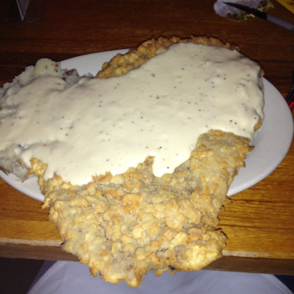 See that slab of chicken fried steak? Well, there's ANOTHER piece under that! It's insane. Best gravy on the planet.