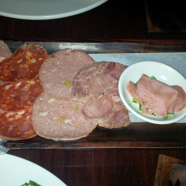 The headcheese and tongue are fantastic. You can't go wrong with the charcuterie and a cocktail, if you don't feel like a full meal.
