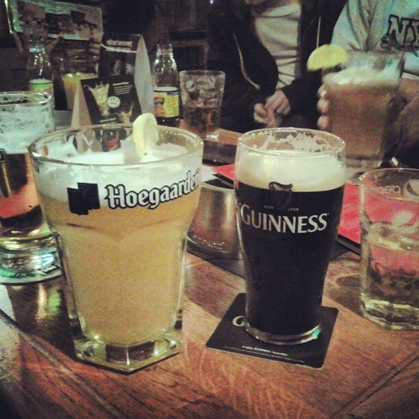 Photo taken at The BLACK STUFF Irish Pub &amp; Whisky Bar by Pawel W. on 12/5/2012