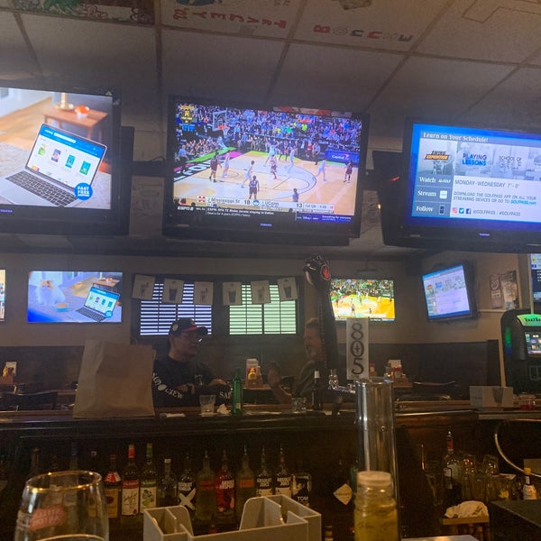 Photo taken at Grunions Sports Bar &amp; Grill by Rose P. on 3/16/2020