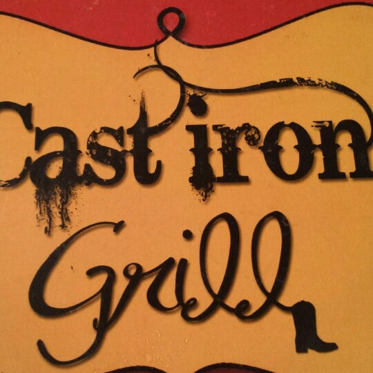 Photo taken at Cast Iron Grill by Adam M. on 10/10/2014