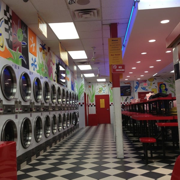 Photo taken at Spin Central Laundromat by Brooklyn H. on 8/9/2013