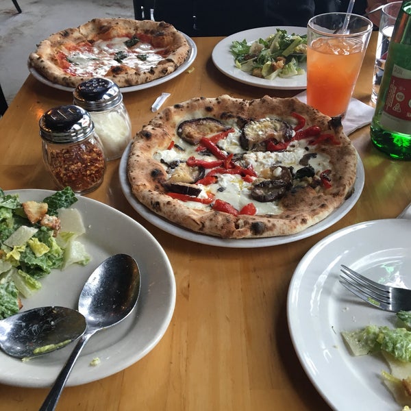 Photo taken at Tutta Bella Neapolitan Pizzeria by Angela V. on 5/17/2017