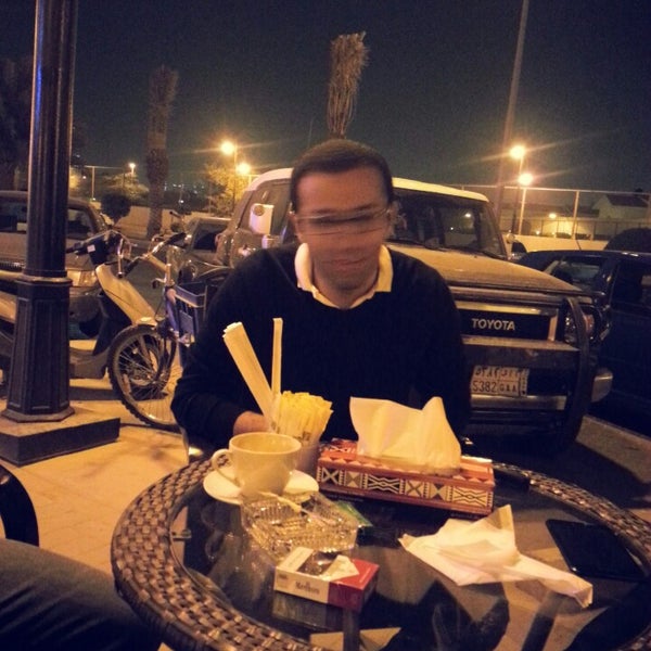 Photo taken at City Cafe by Amr T. on 3/13/2013