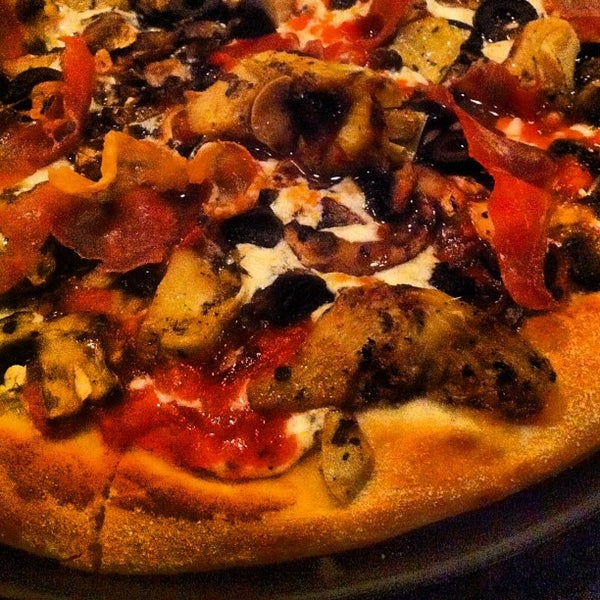 Photo taken at Goodfella&#39;s Woodfired Pizza Pasta Bar by David P. on 10/6/2012