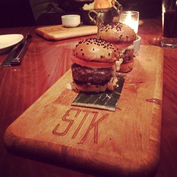 Photo taken at STK Steakhouse Midtown NYC by Alex S. on 3/3/2014