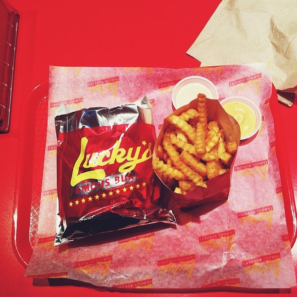 Photo taken at Lucky&#39;s Famous Burgers by Calvin T. on 10/10/2012