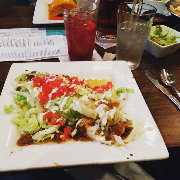 Photo taken at Blue Agave Grill by Reid G. on 5/31/2015