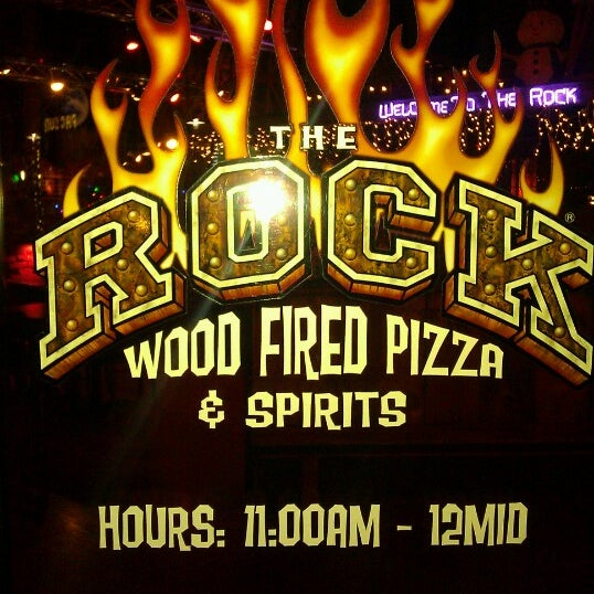 Photo taken at The Rock Wood Fired Pizza by Eric D. on 12/30/2012