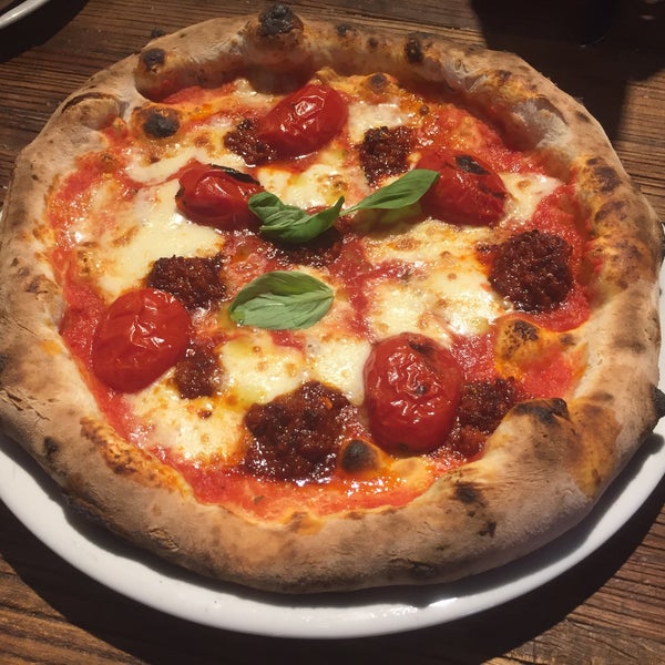 Good Neapolitan style pizza with thick dough.