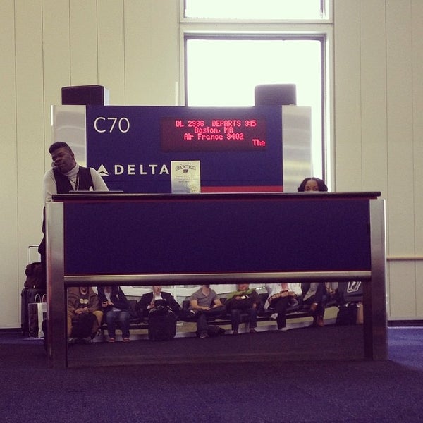 Photo taken at Delta Ticket Counter by Anton T. on 4/17/2014