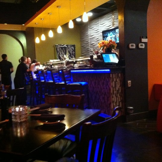 Photo taken at Takara Sushi &amp; Sake Lounge by Erin M. on 11/30/2012